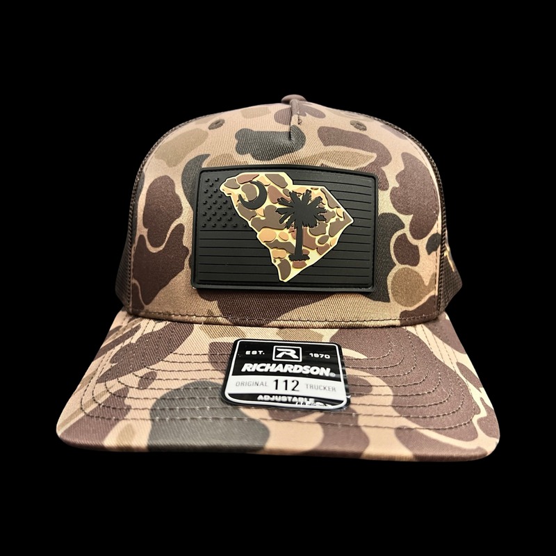 864 Richardson Brown Duck Camo Blackout Performance Patch Lowcountry Trucker
