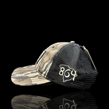 864 Richardson Bottomland Camo Performance PVC Patch Relaxed Trucker Hat