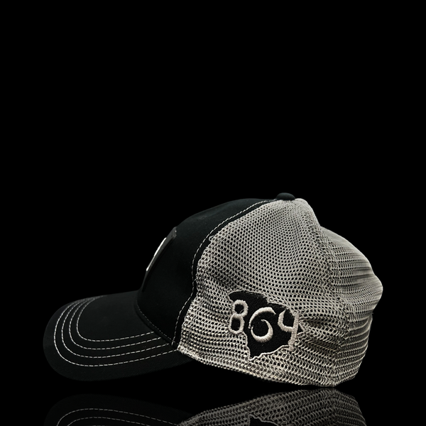 864 Richardson Performance PVC Patch Relaxed Black Steel Trucker Hat