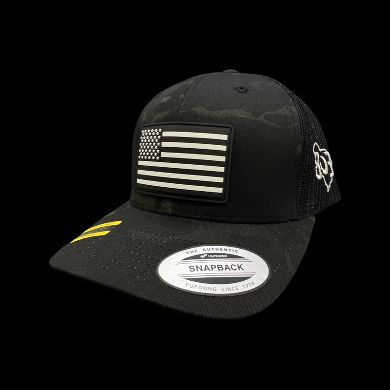 Yupoong Black Camo Vintage Black and White Old Glory PVC Patch Trucker Hat
